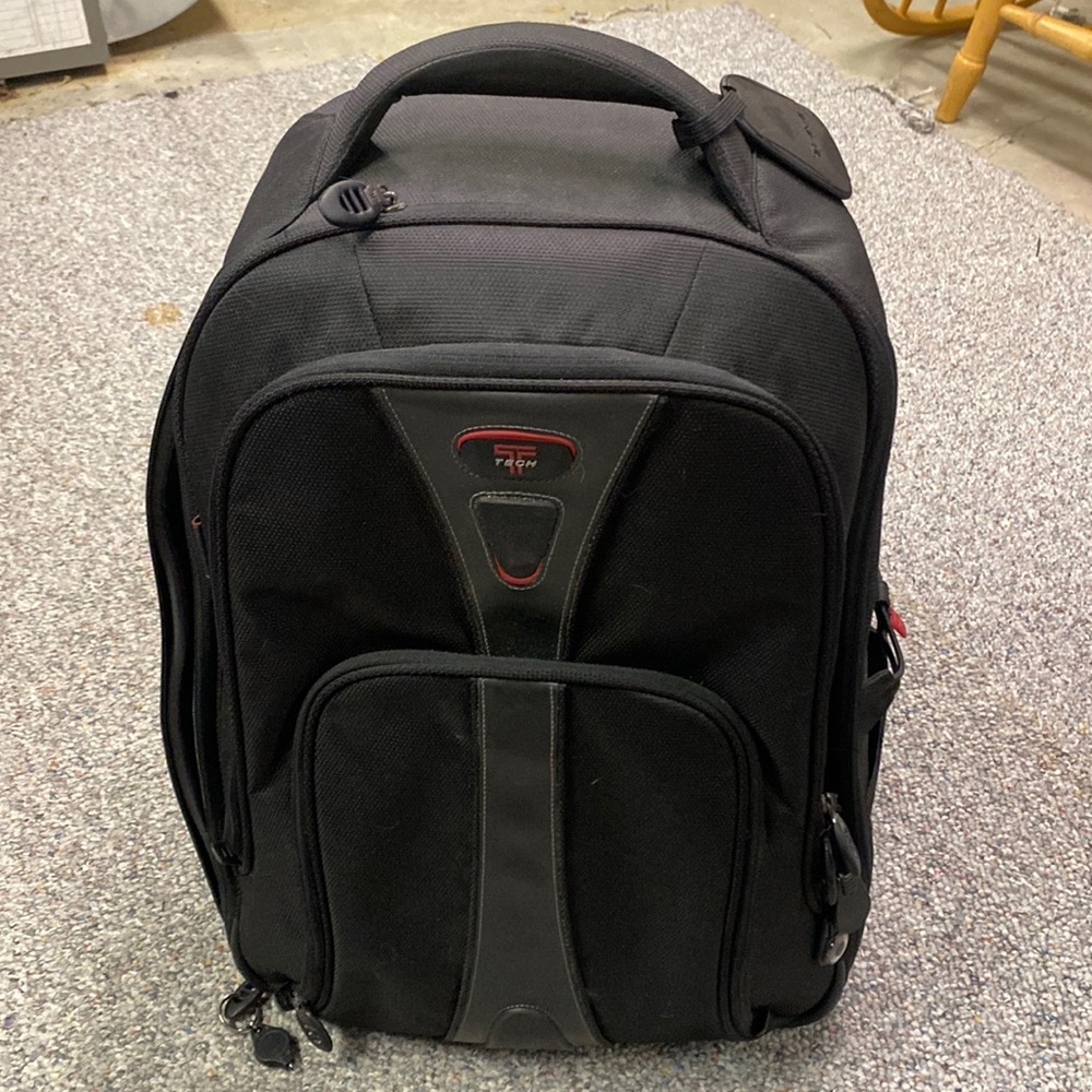 Tumi rolling luggage bag